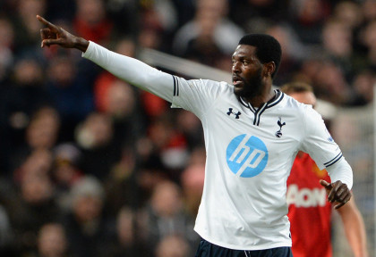 MANCHESTER, ENGLAND - JANUARY 01:  Emmanuel Adebayor of Tottenham Hotspur celebrates scoring the opening goal during the Barclays Premier League match between Manchester United and Tottenham Hotspur at Old Trafford on January 1, 2014 in Manchester, England.  (Photo by Michael Regan/Getty Images)